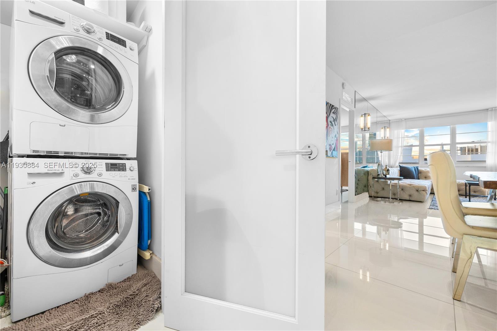 100 Lincoln Road, Unit 1523 Miami Beach, FL 33139 - Photo 19 of 24 a view of a hallway with washer and dryer
