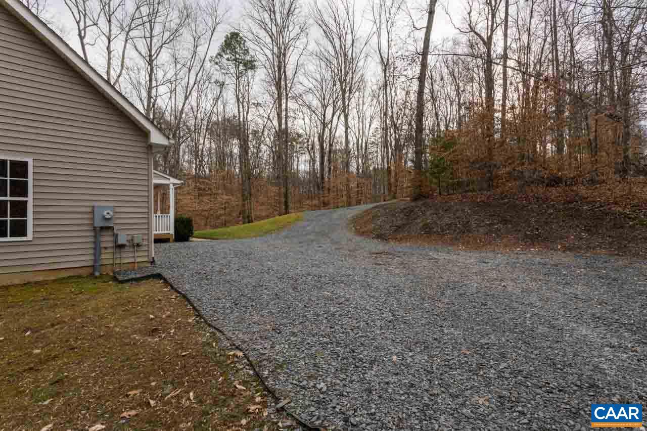 53 East Point Road Palmyra, VA 22963 - Photo 34 of 47 a view of a backyard with large trees
