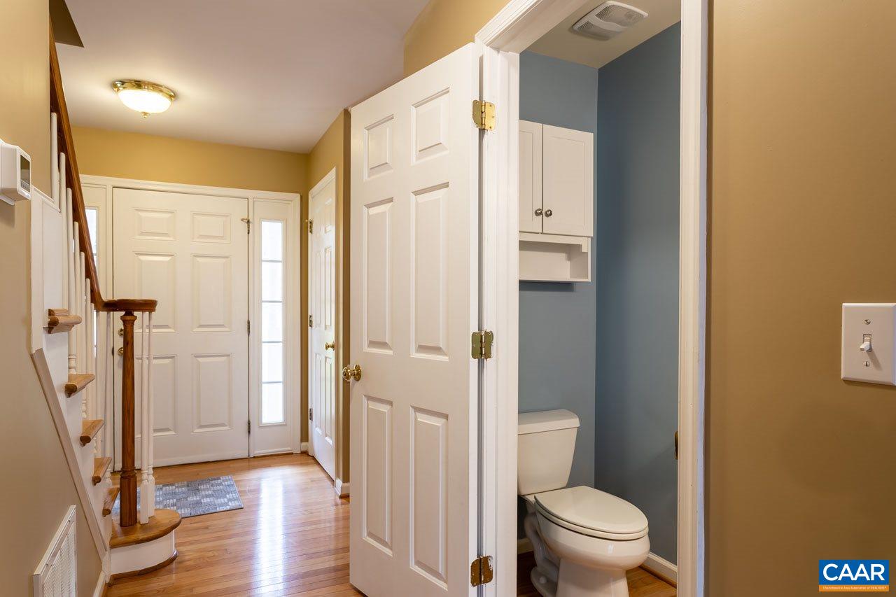 53 East Point Road Palmyra, VA 22963 - Photo 8 of 47 a bathroom with a granite countertop toilet and a sink