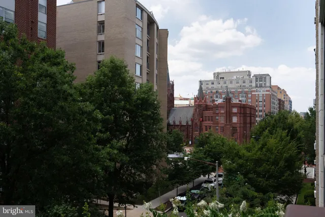a view of a city with tall buildings