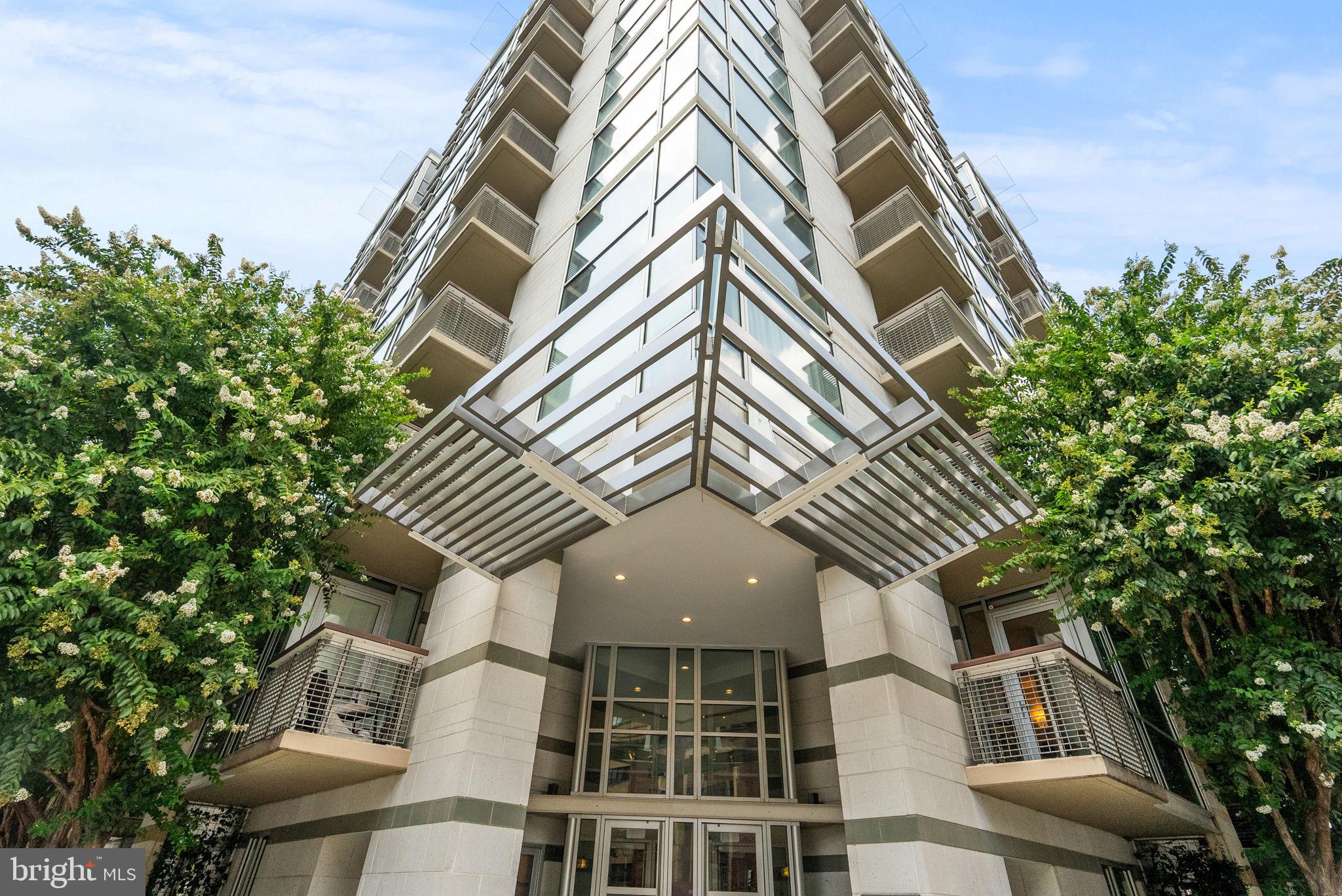 1300 13th Street Northwest, Unit 408 Washington, DC 20005 - Photo 2 of 47 a front view of a building