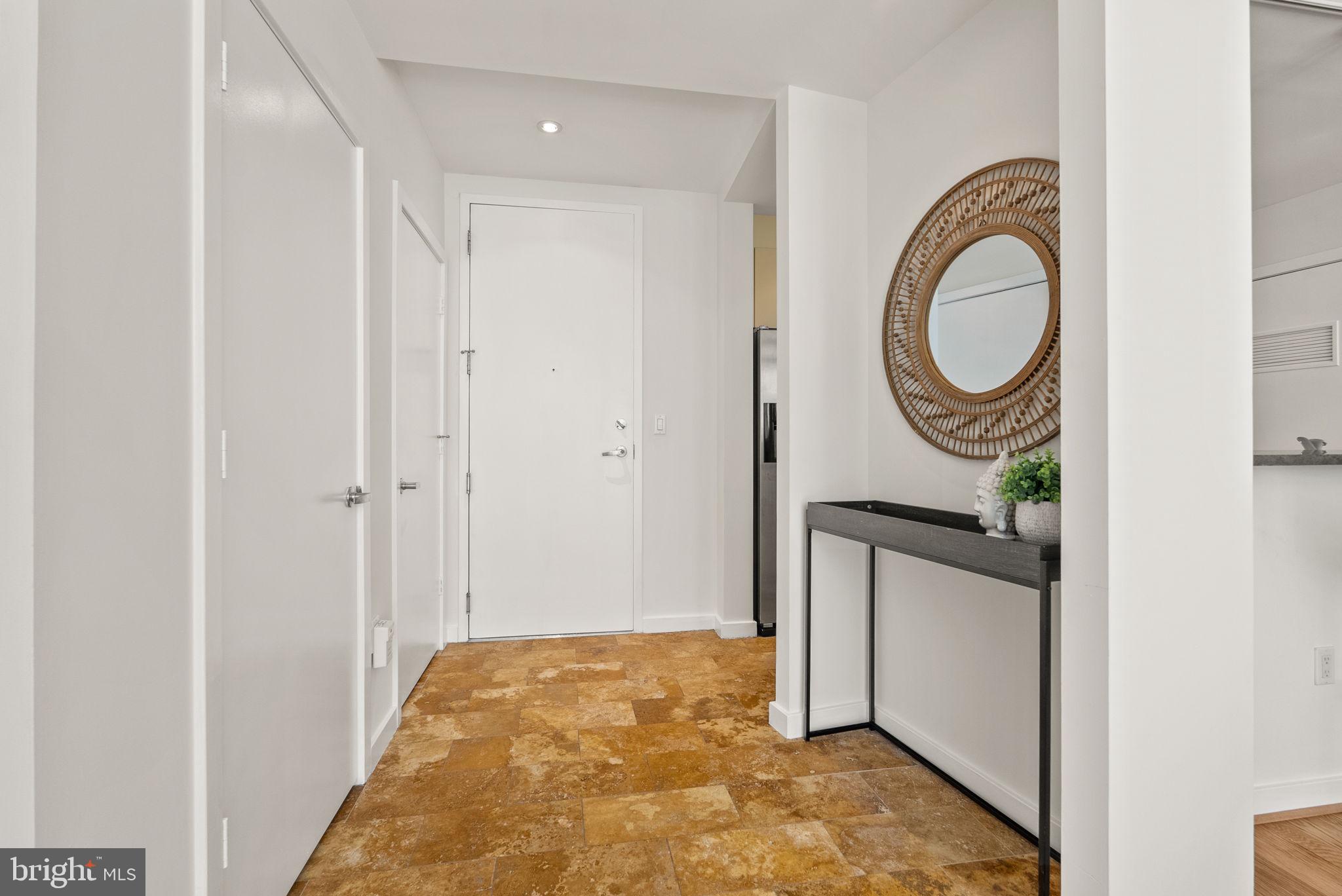 1300 13th Street Northwest, Unit 408 Washington, DC 20005 - Photo 22 of 47 a view of a bathroom with sink and mirror