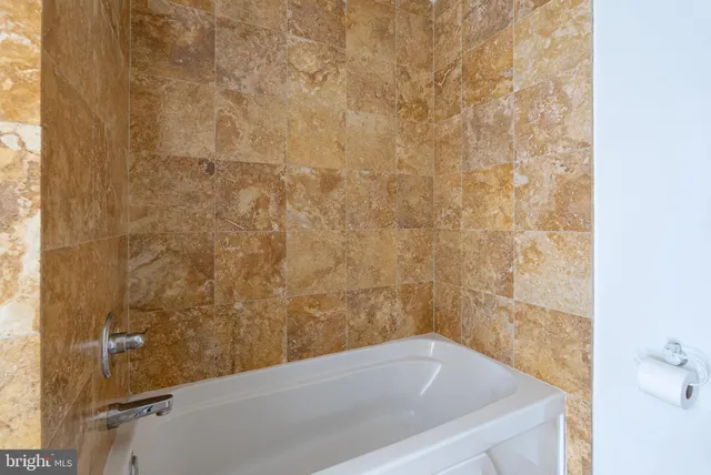 a bathroom with a bathtub