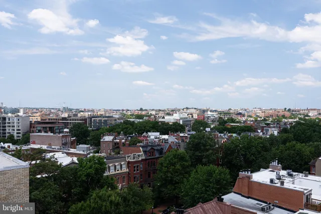 a patio with table and chairs