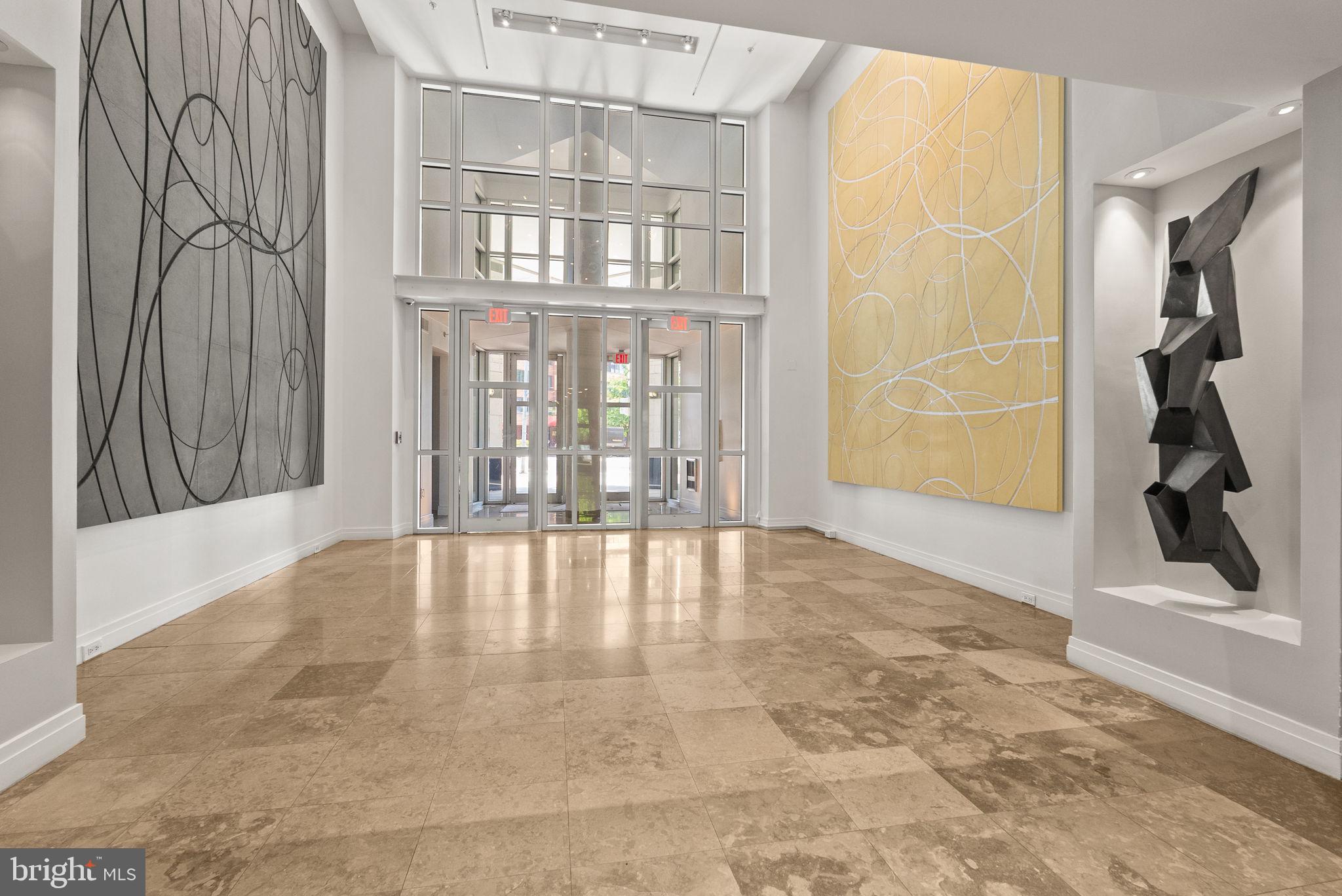 1300 13th Street Northwest, Unit 408 Washington, DC 20005 - Photo 4 of 47 a view of an empty room with a window
