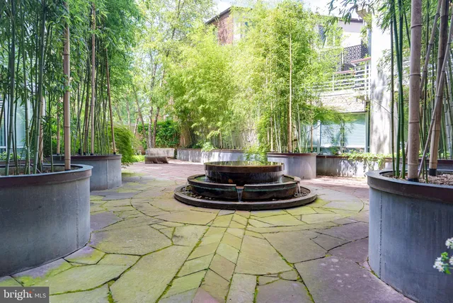 a view of a lobby with a fountain