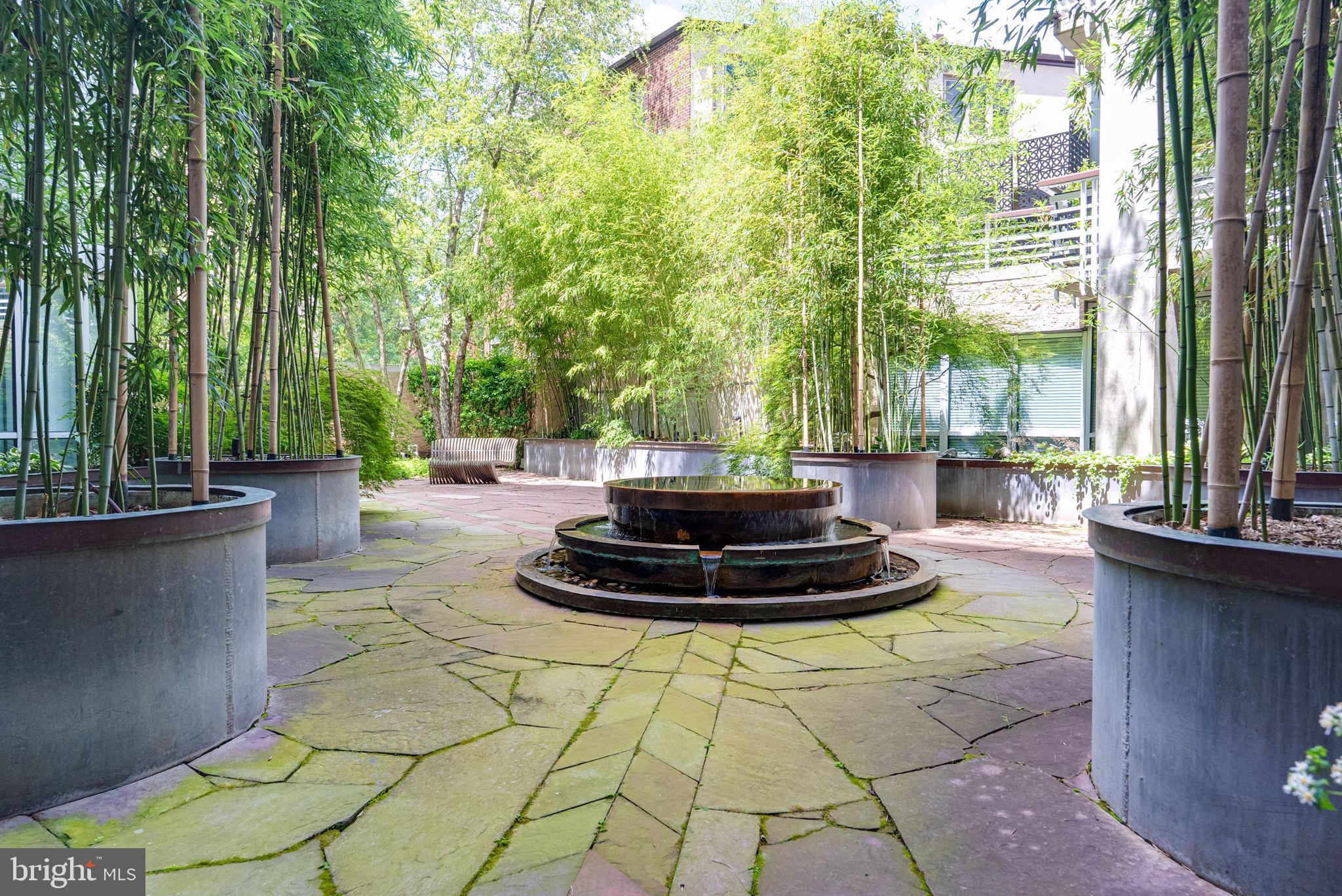 1300 13th Street Northwest, Unit 408 Washington, DC 20005 - Photo 5 of 47 a view of a lobby with a fountain