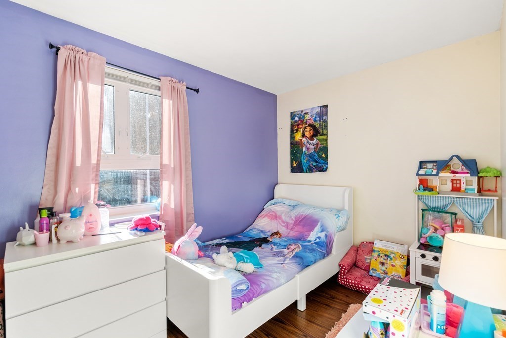 194 Lexington Street, Unit 1 Watertown, MA 02472 - Photo 8 of 10 a kids room with toys and a couch