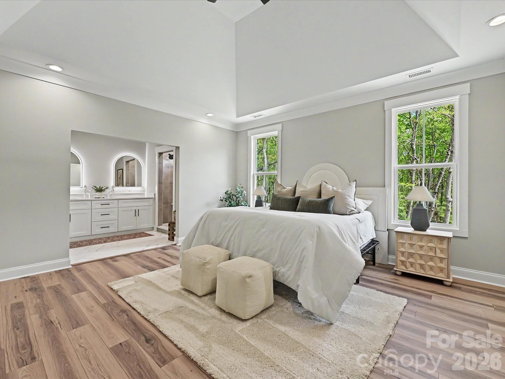 5310 West Liberty Hill Road York, SC 29745 - Photo 13 of 29 a bedroom with a bed and wooden floor