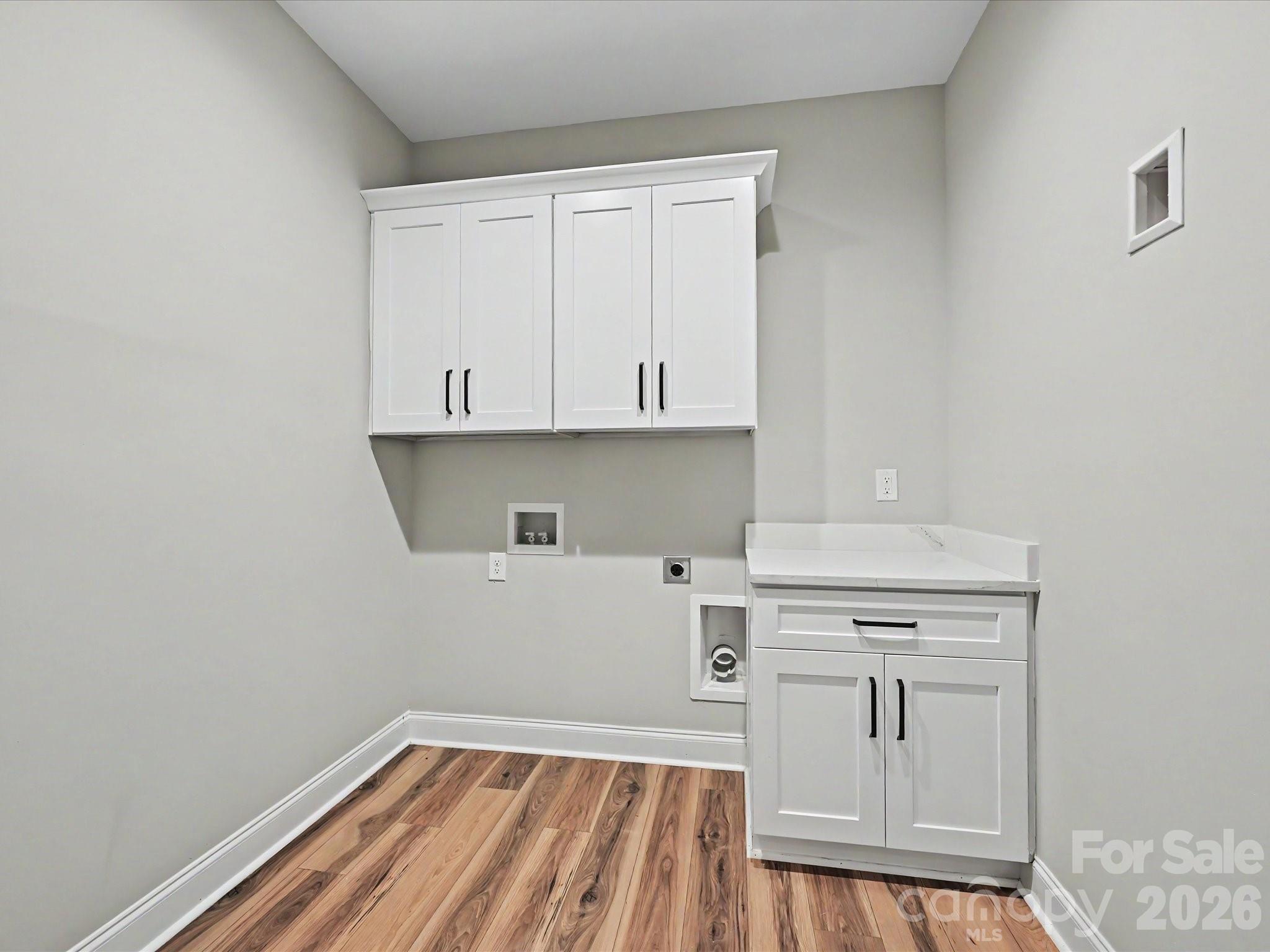 5310 West Liberty Hill Road York, SC 29745 - Photo 17 of 29 a view of a kitchen with white cabinets