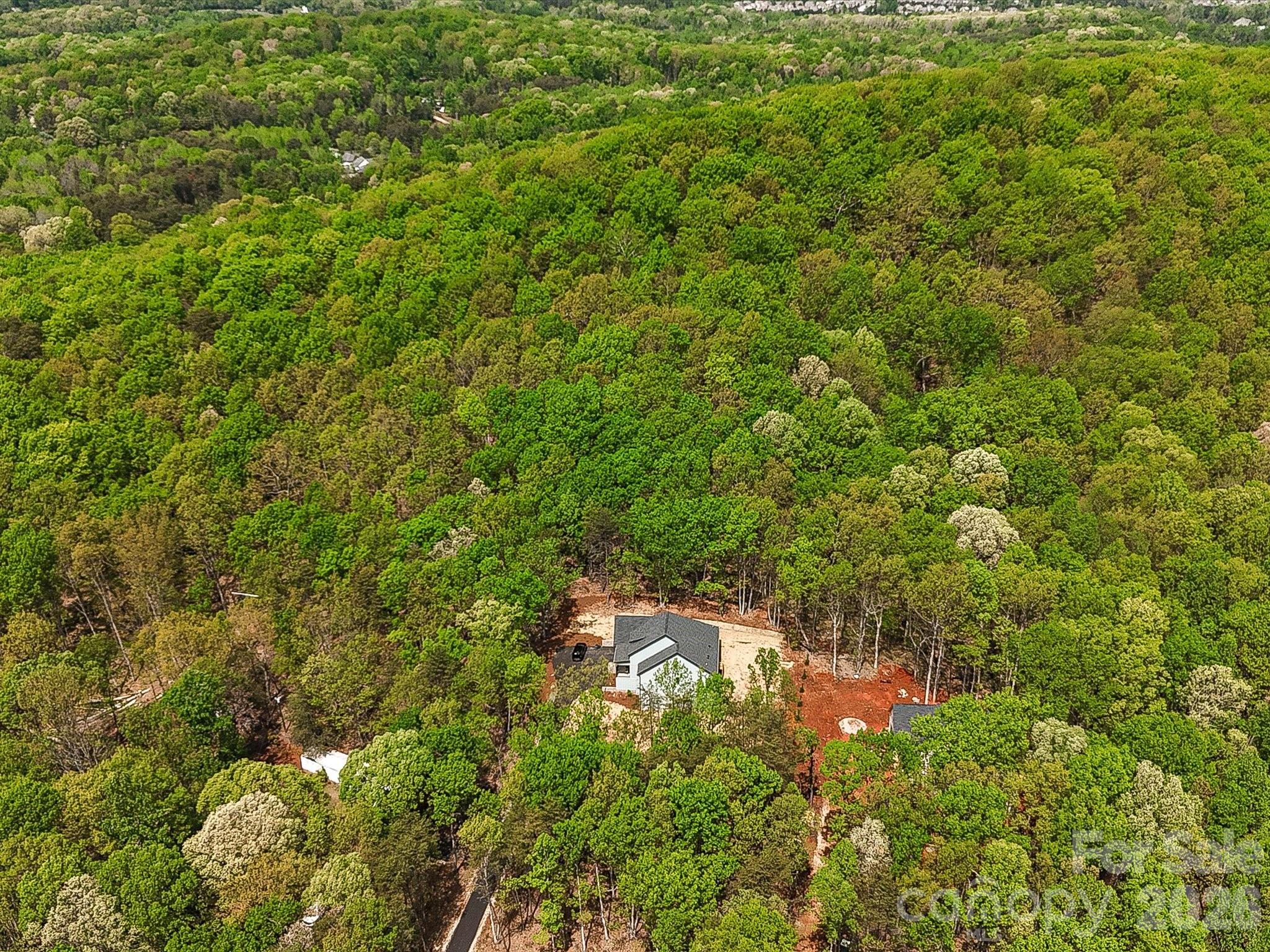 5310 West Liberty Hill Road York, SC 29745 - Photo 2 of 29 a view of a lush green forest