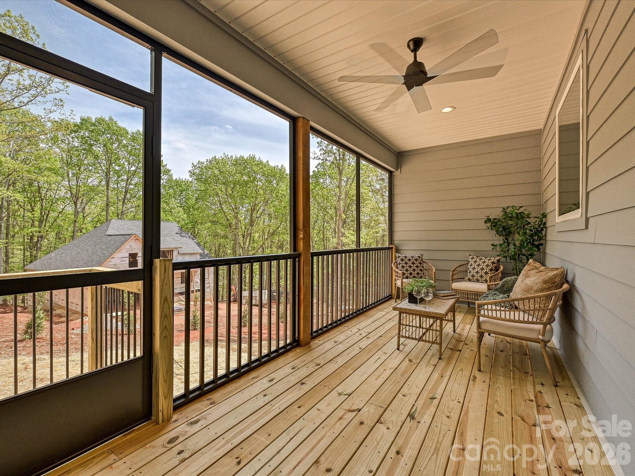5310 West Liberty Hill Road York, SC 29745 - Photo 22 of 29 a balcony with wooden floor and outdoor seating