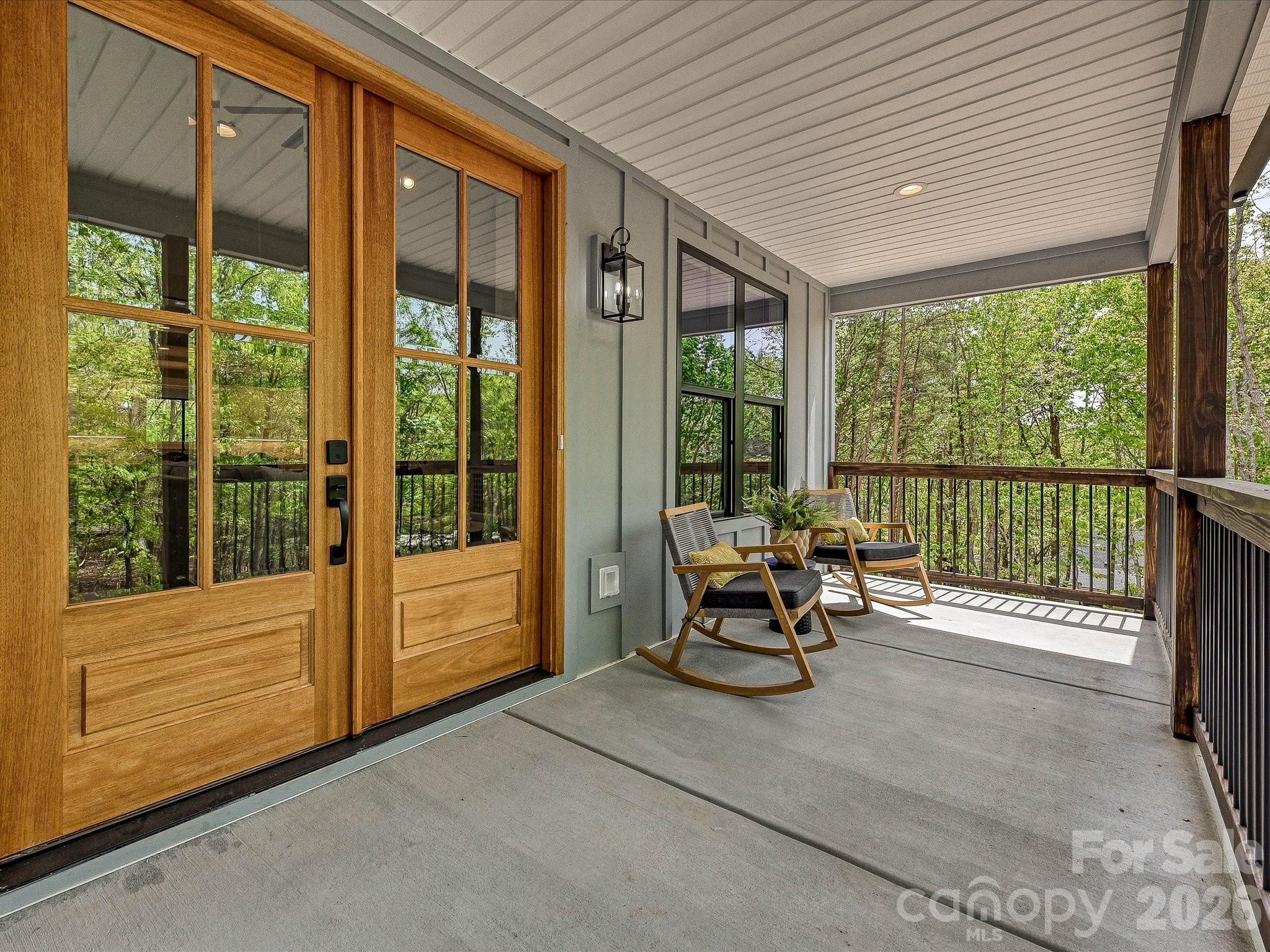5310 West Liberty Hill Road York, SC 29745 - Photo 3 of 29 a view of a patio with a table and chairs