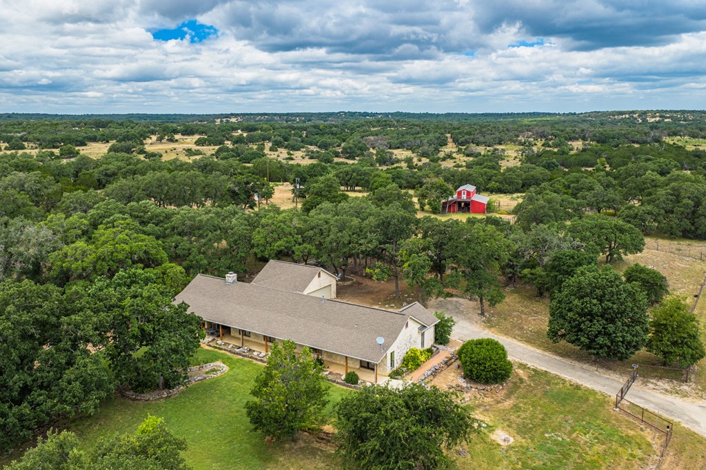 118 Re Ranch Road Kerrville, TX 78028 - Photo 3 of 36 Main House, Red Barn in background.