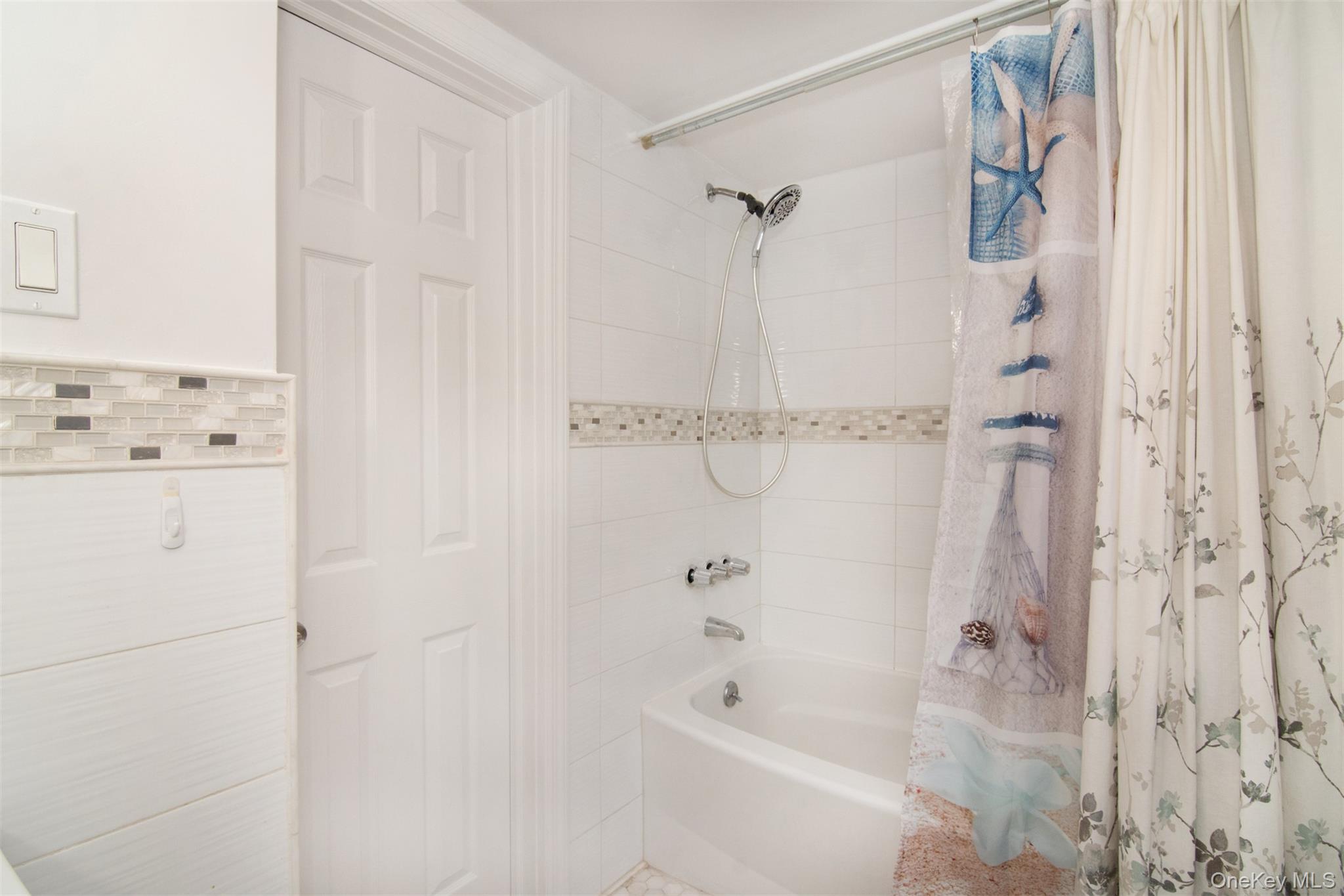 44 Ridge Street, Unit 1 Hastings-on-Hudson, NY 10706 - Photo 10 of 16 Bathroom featuring shower / tub combo