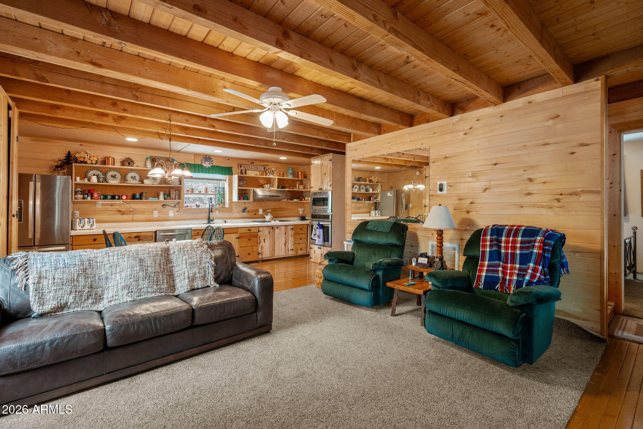 2095 Ranger Road Overgaard, AZ 85933 - Photo 6 of 25 a living room with furniture and a ceiling fan