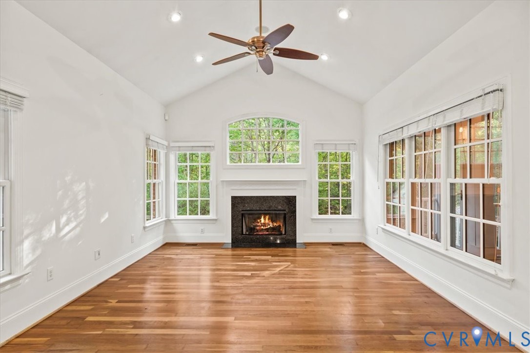 3308 Yarding Way Toano, VA 23168 - Photo 38 of 83 a view of an empty room with a window and a fireplace