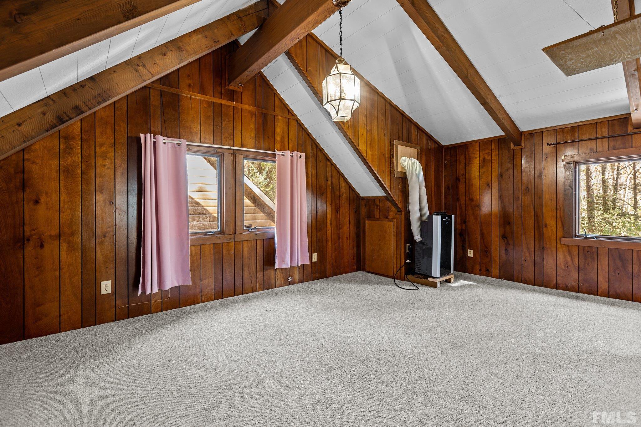300 Rabbit Run Pittsboro, NC 27312 - Photo 16 of 38 a view of an empty room with large windows