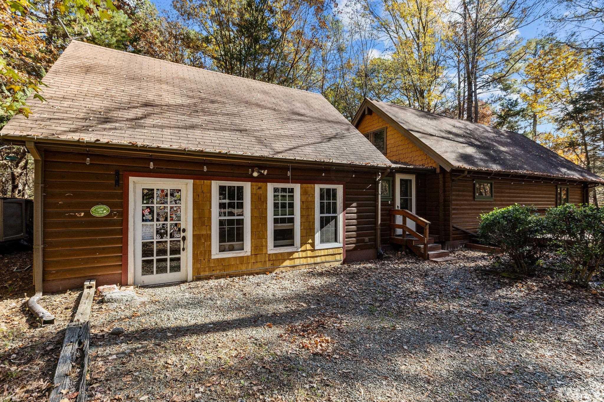 300 Rabbit Run Pittsboro, NC 27312 - Photo 21 of 38 a front view of a house with garden