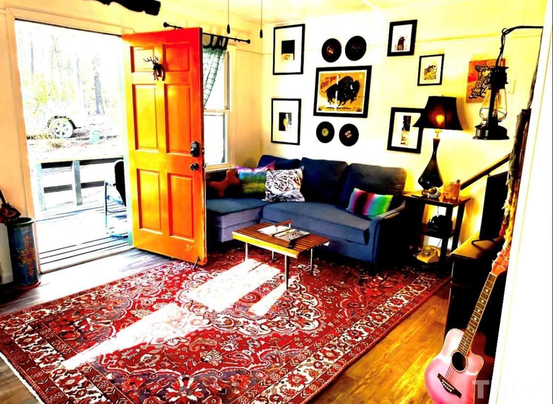 300 Rabbit Run Pittsboro, NC 27312 - Photo 26 of 38 a living room with furniture and rug floor