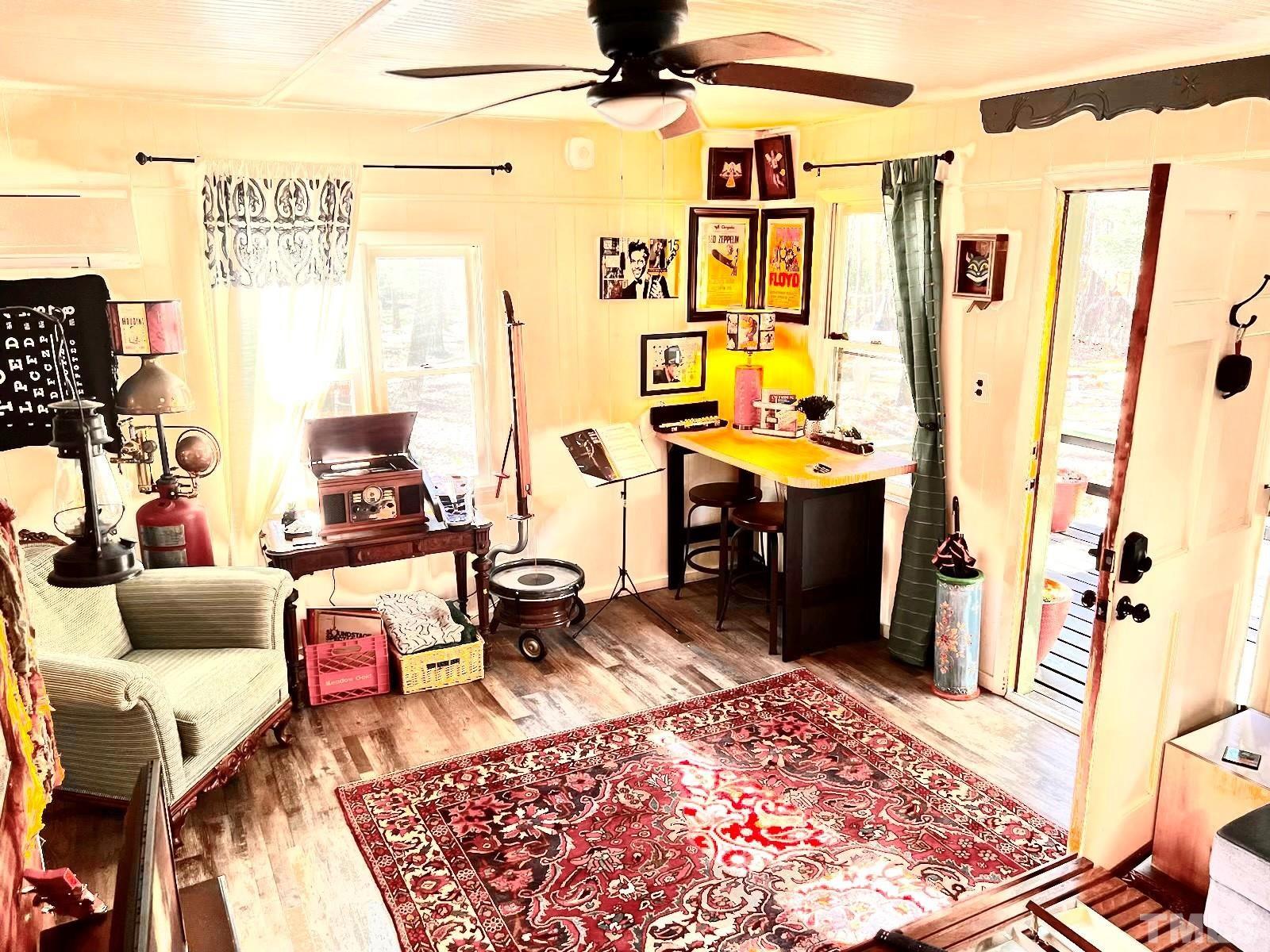 300 Rabbit Run Pittsboro, NC 27312 - Photo 28 of 38 a living room with furniture and a rug