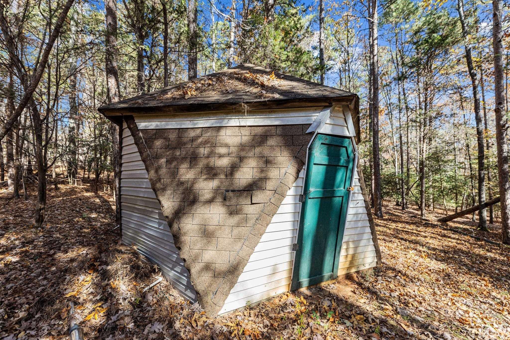 300 Rabbit Run Pittsboro, NC 27312 - Photo 32 of 38 a pathway of a house with a trees