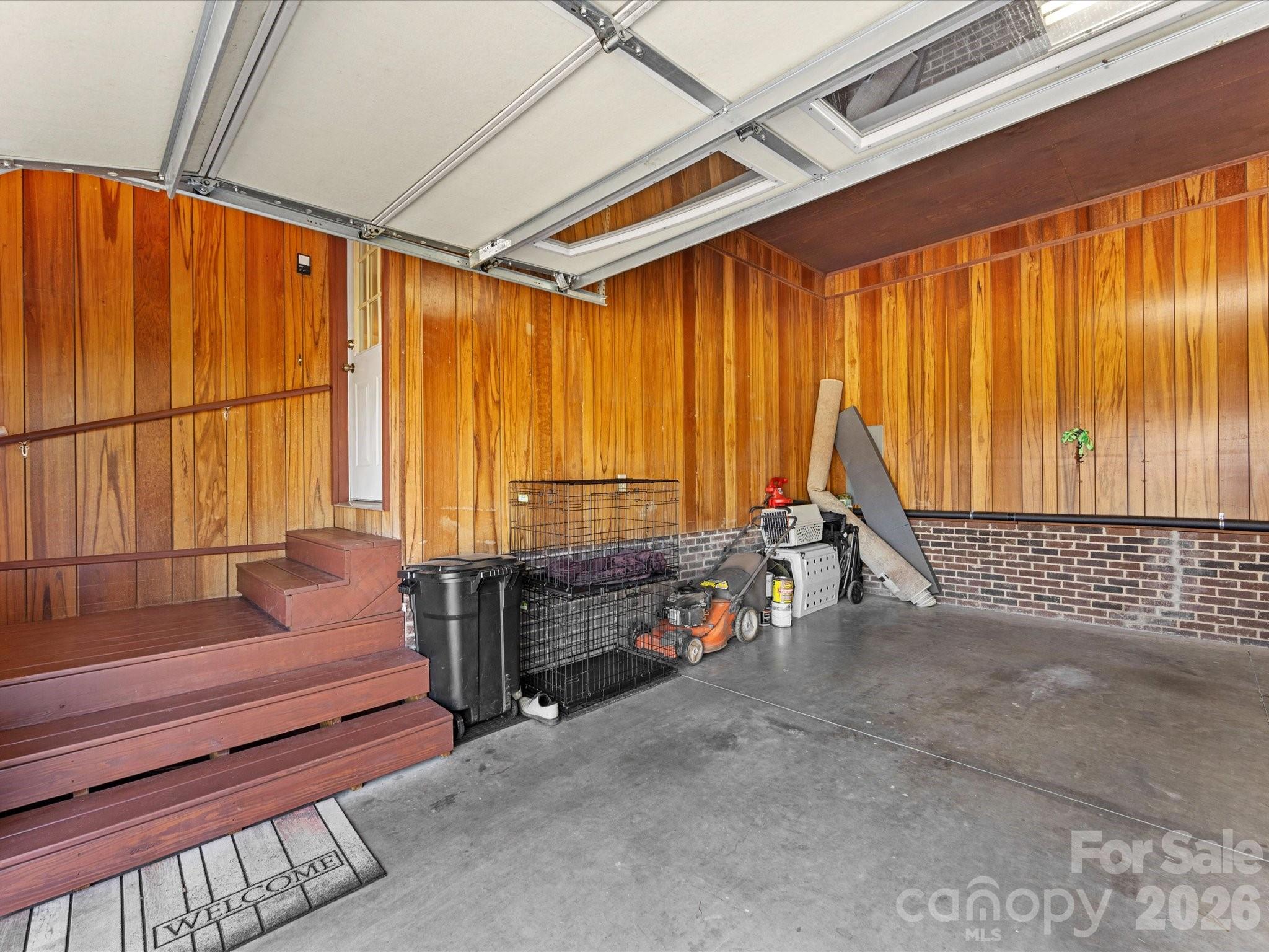 3489 Lake Shore Road South Denver, NC 28037 - Photo 25 of 31 a view of a room with furniture and floor to ceiling window