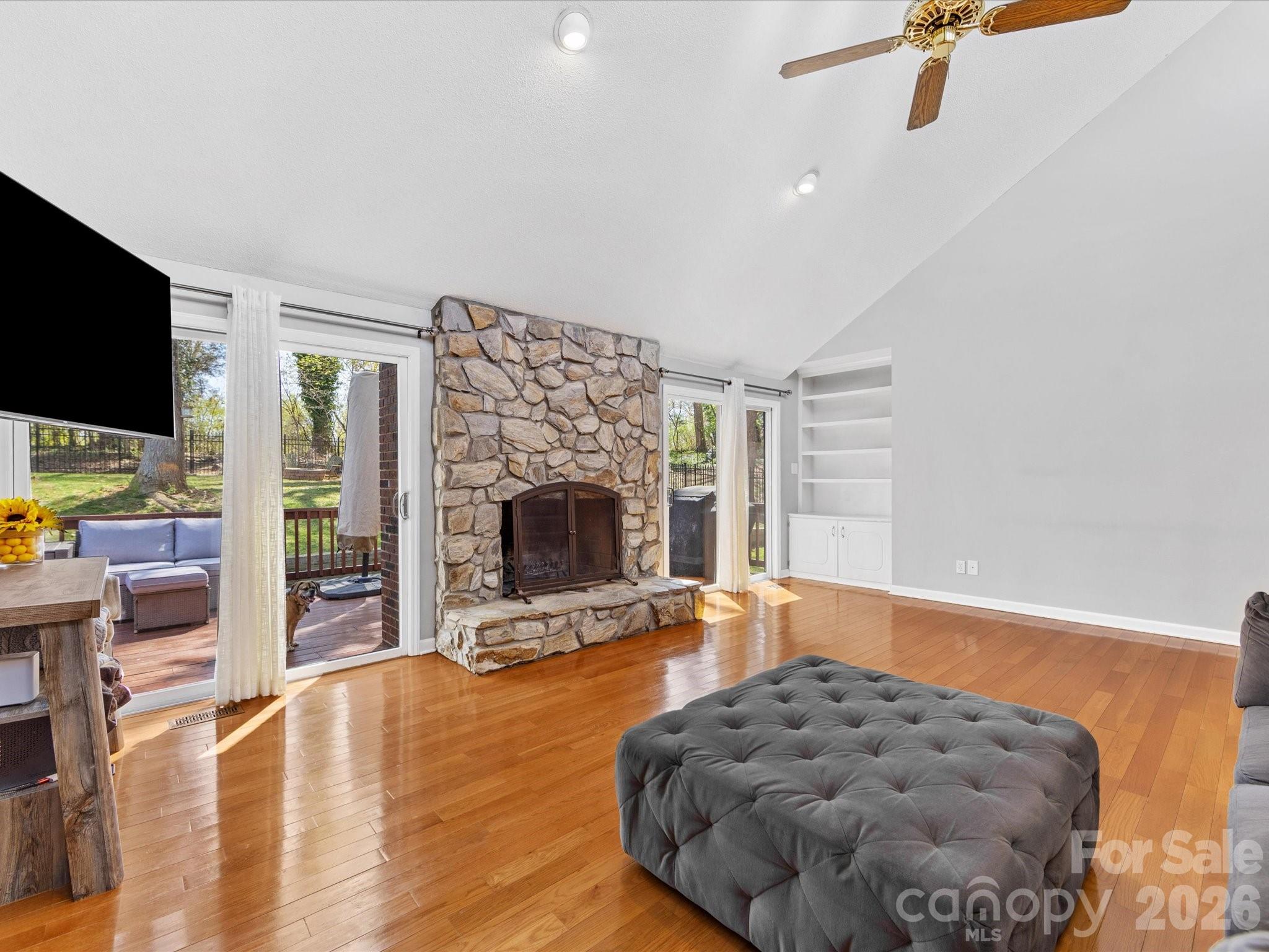 3489 Lake Shore Road South Denver, NC 28037 - Photo 7 of 31 a living room with furniture and a flat screen tv