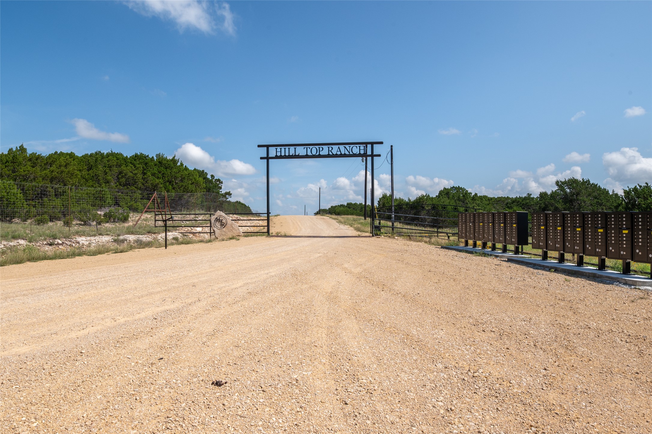 140 Longview Lane Cherokee, TX 76832 - Photo 3 of 8 A private ranch entrance with a gated driveway offers exclusive access to the property.
