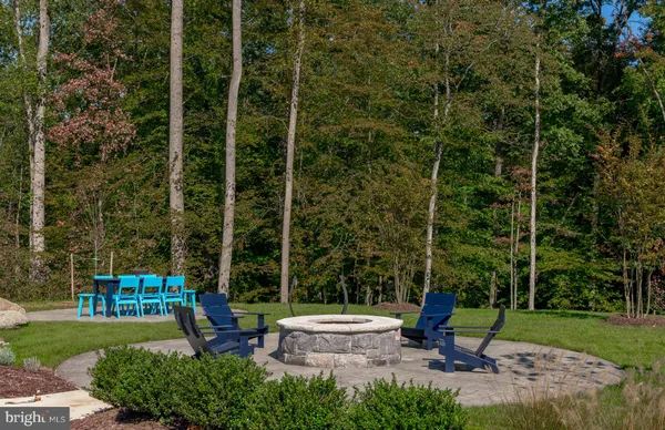 a garden view with a seating space