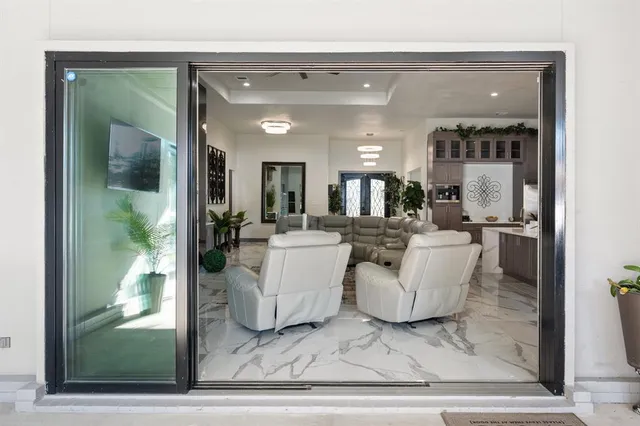 a living room with couches and a coffee table