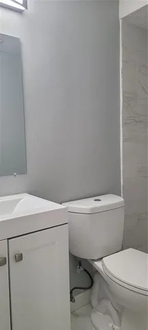 a room with a bed and a window