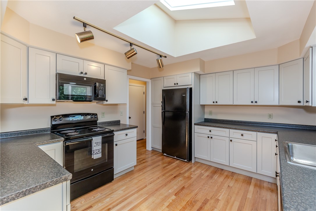 26 Seneca Road Portsmouth, RI 02871 - Photo 13 of 44 Kitchen with skylight