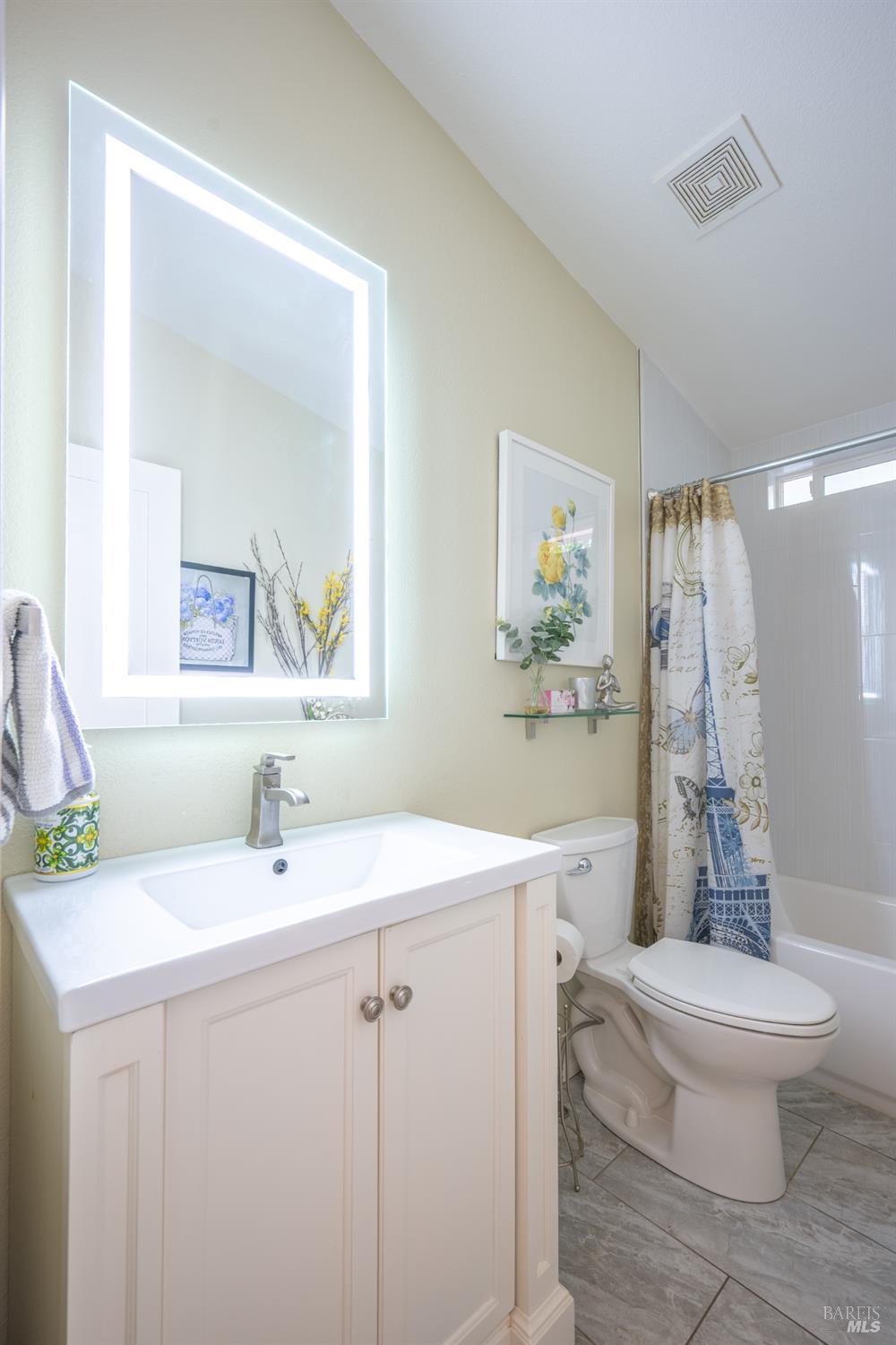 22945 Ridge Road Willits, CA 95490 - Photo 14 of 48 a bathroom with a sink toilet and a mirror
