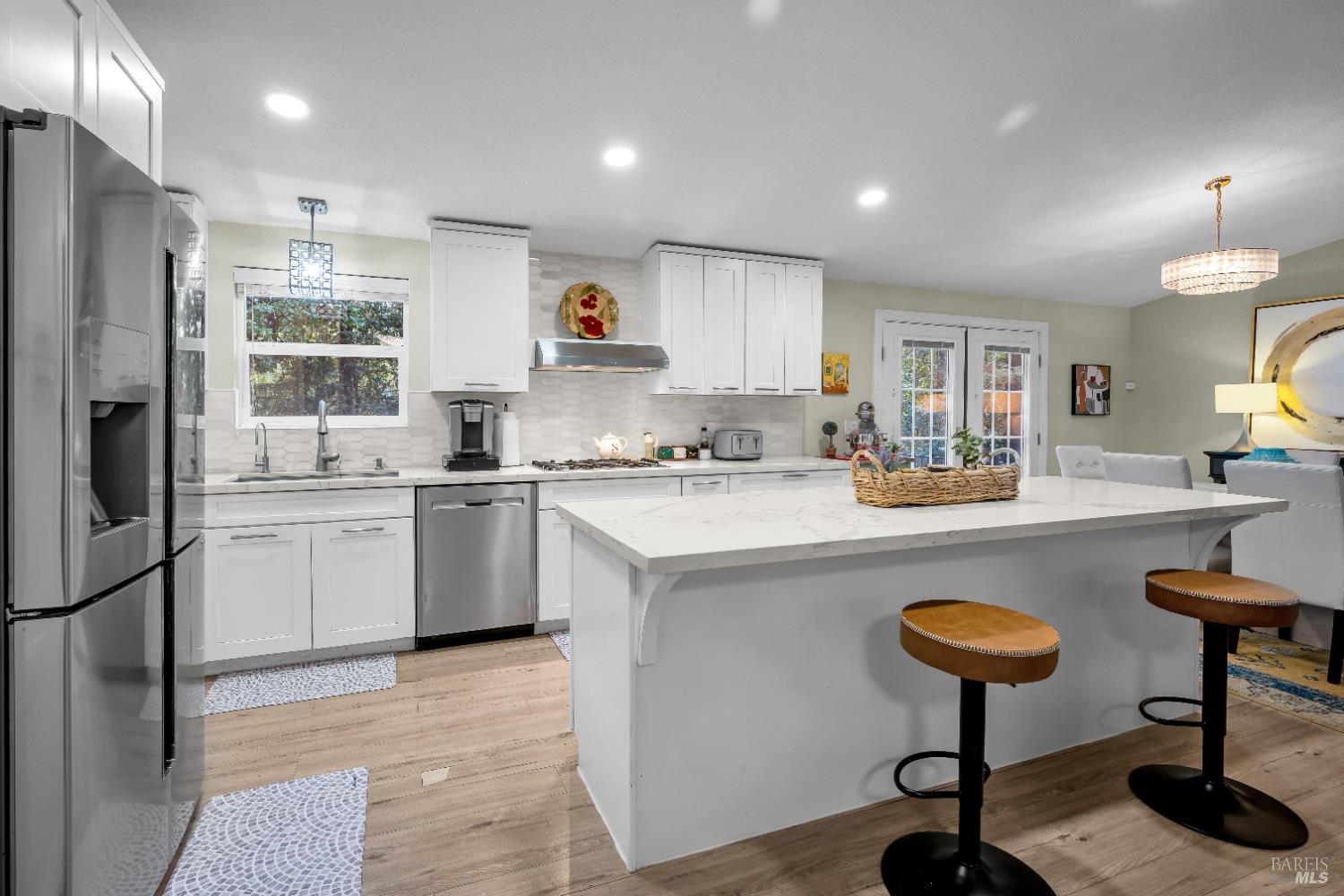 22945 Ridge Road Willits, CA 95490 - Photo 15 of 48 a kitchen with sink refrigerator and cabinets