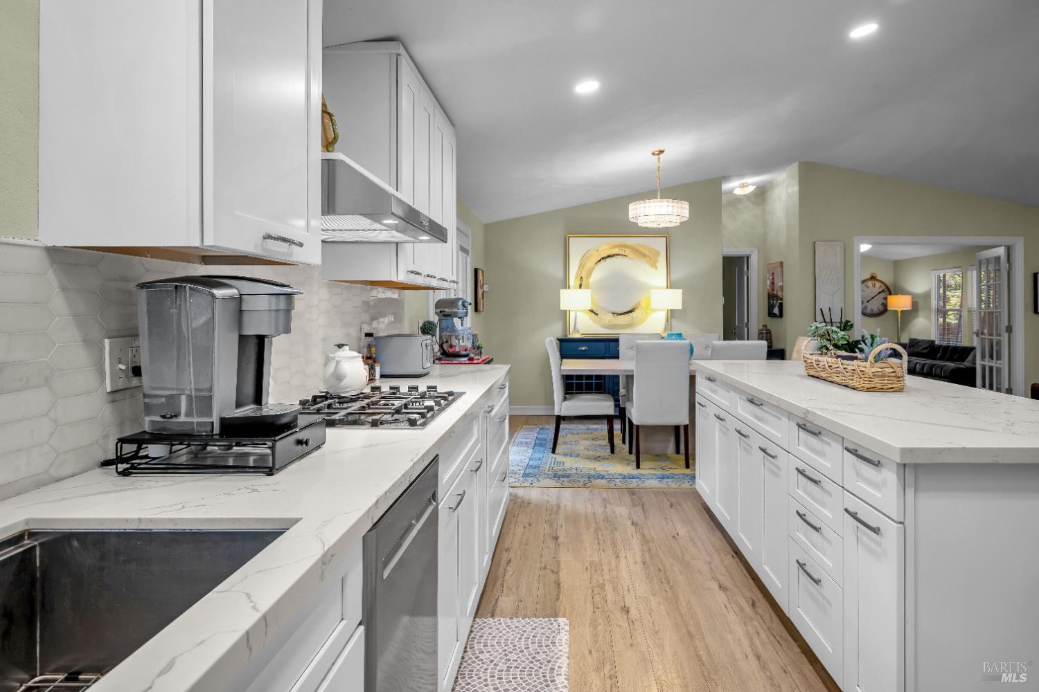 22945 Ridge Road Willits, CA 95490 - Photo 16 of 48 a kitchen with a sink stove and cabinets