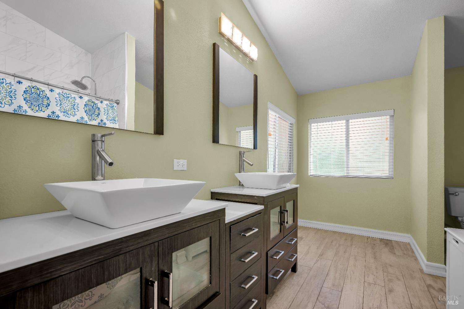 22945 Ridge Road Willits, CA 95490 - Photo 20 of 48 a spacious bathroom with a sink and a mirror