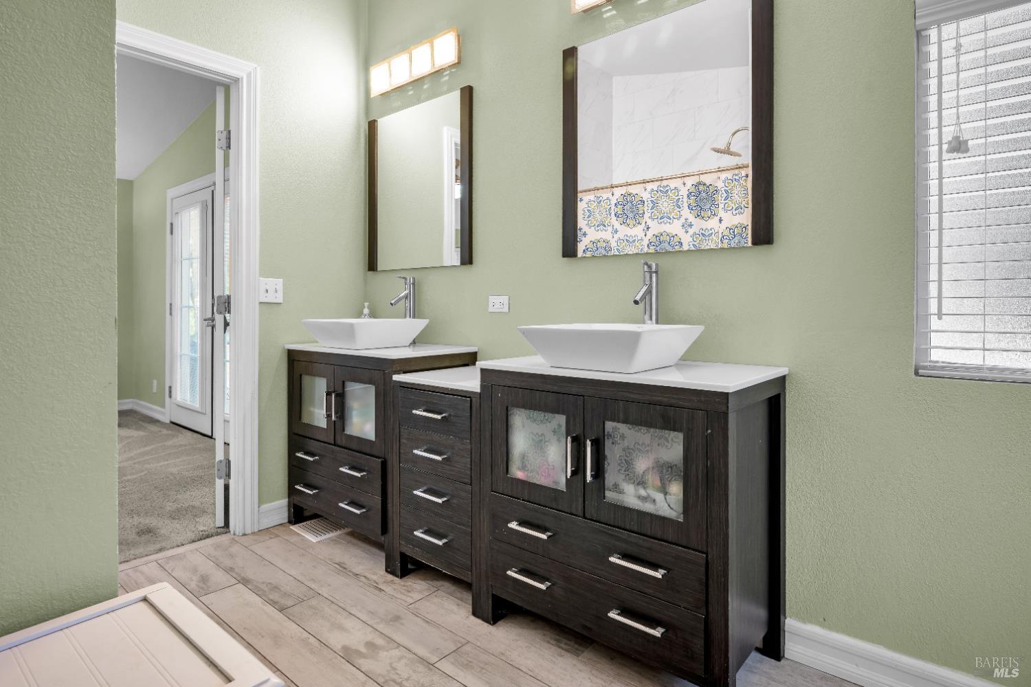 22945 Ridge Road Willits, CA 95490 - Photo 21 of 48 a bathroom with a sink vanity and mirror