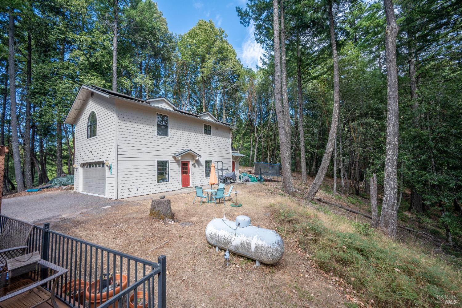 22945 Ridge Road Willits, CA 95490 - Photo 30 of 48 a view of backyard with green space and seating area