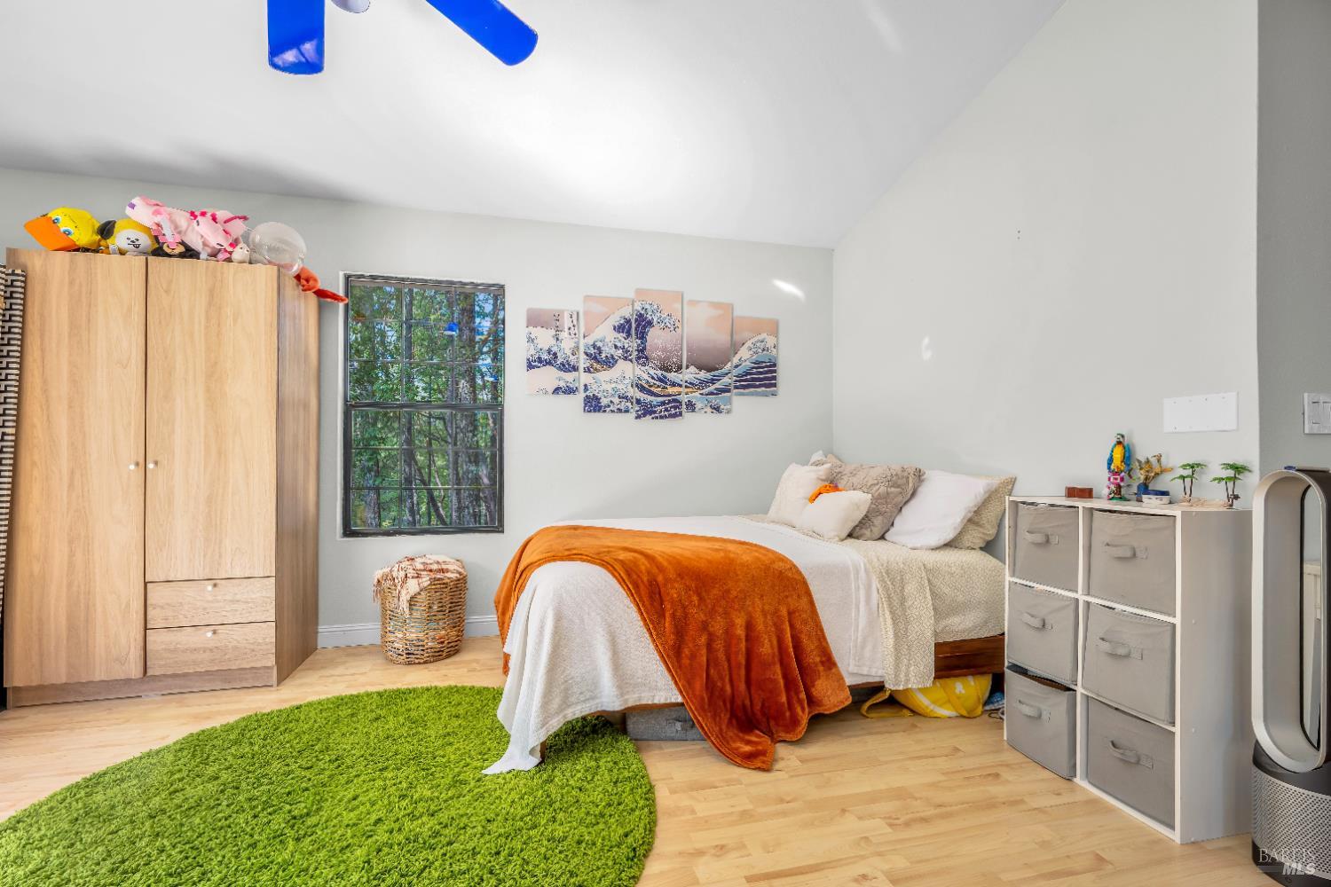 22945 Ridge Road Willits, CA 95490 - Photo 36 of 48 a bedroom with a bed and a window