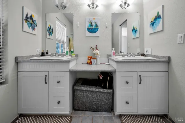 a view of a swimming pool with a patio and a garden