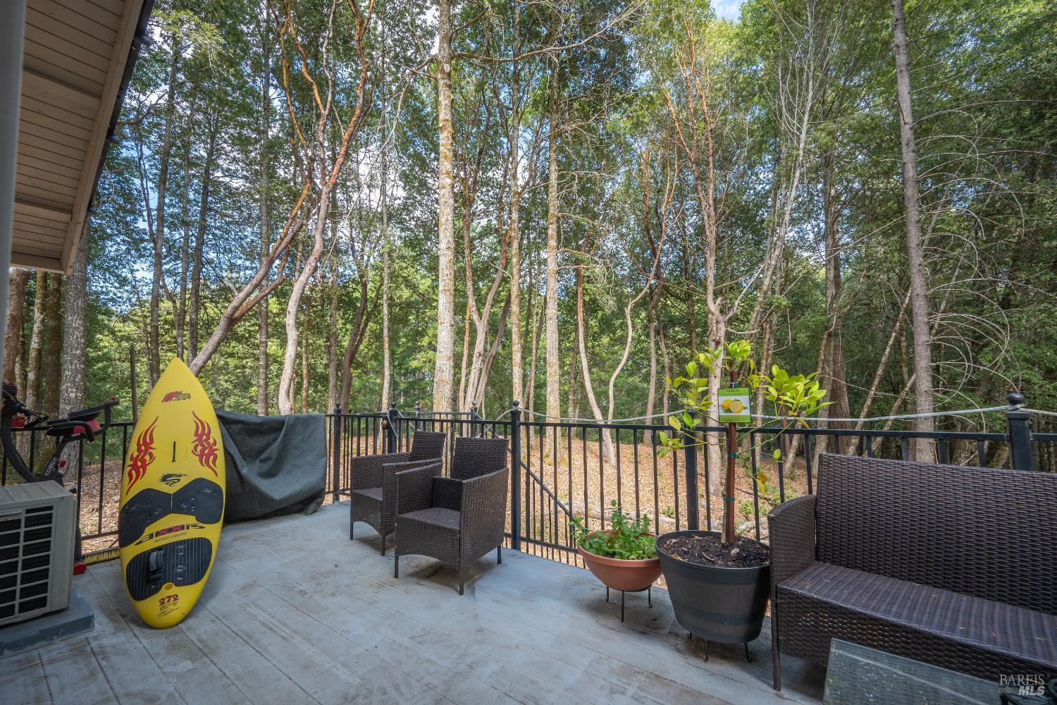 22945 Ridge Road Willits, CA 95490 - Photo 40 of 48 a view of a swimming pool with a patio and a garden
