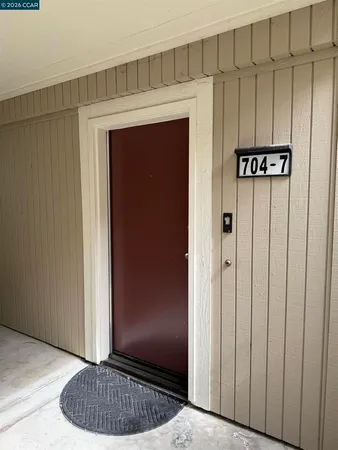 a view of a hallway with closet