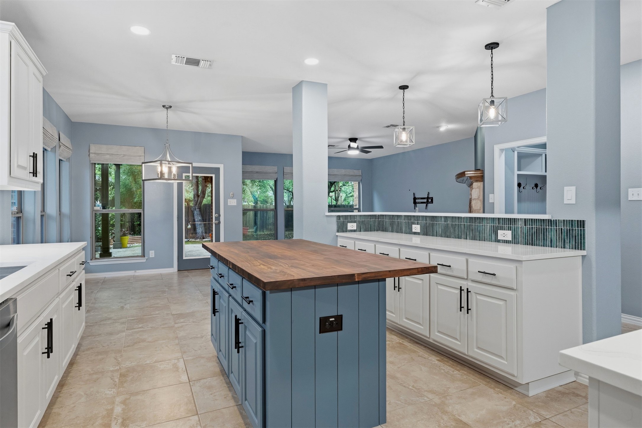 3935 Bowstring Bend Cedar Park, TX 78613 - Photo 9 of 39 The heart of the daily routine, this kitchen is centered around an island that’s ideal for quick meals or weekend prep