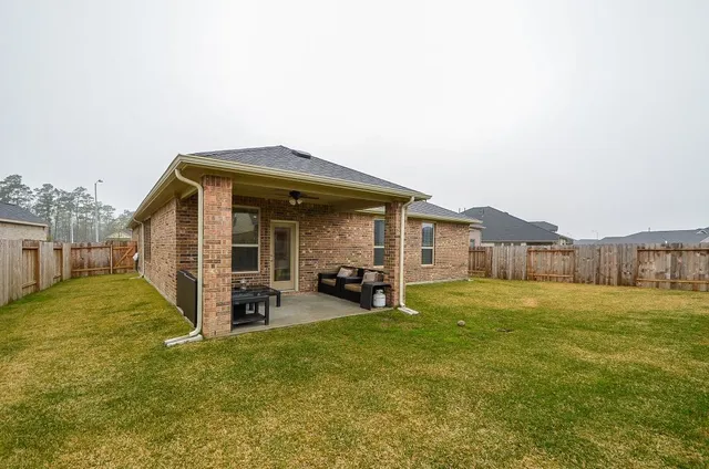 a view of a house with a garden
