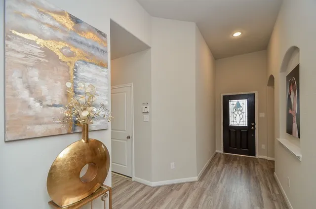 a view of livingroom with furniture and wooden floor