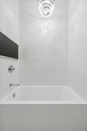 a bathroom with a bathtub