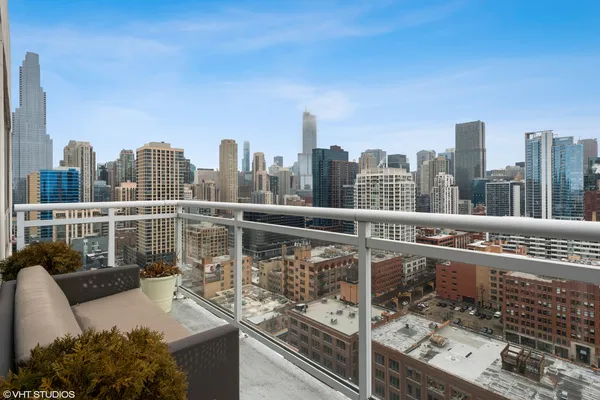 a view of a balcony with city view