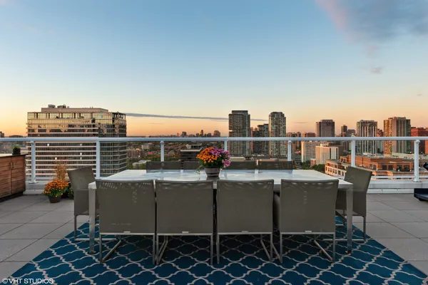 a view of a terrace with sitting area