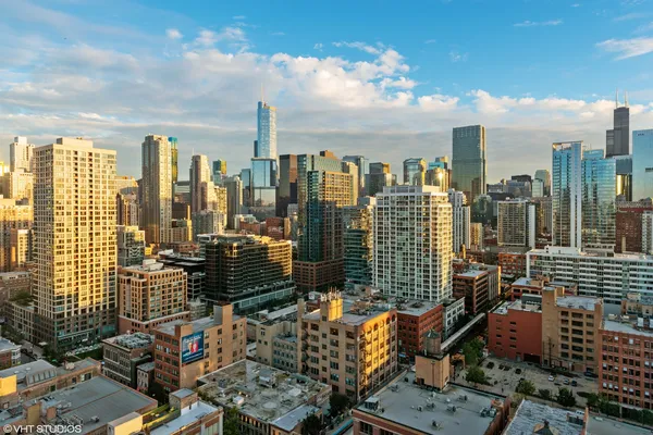 a view of a city with tall buildings